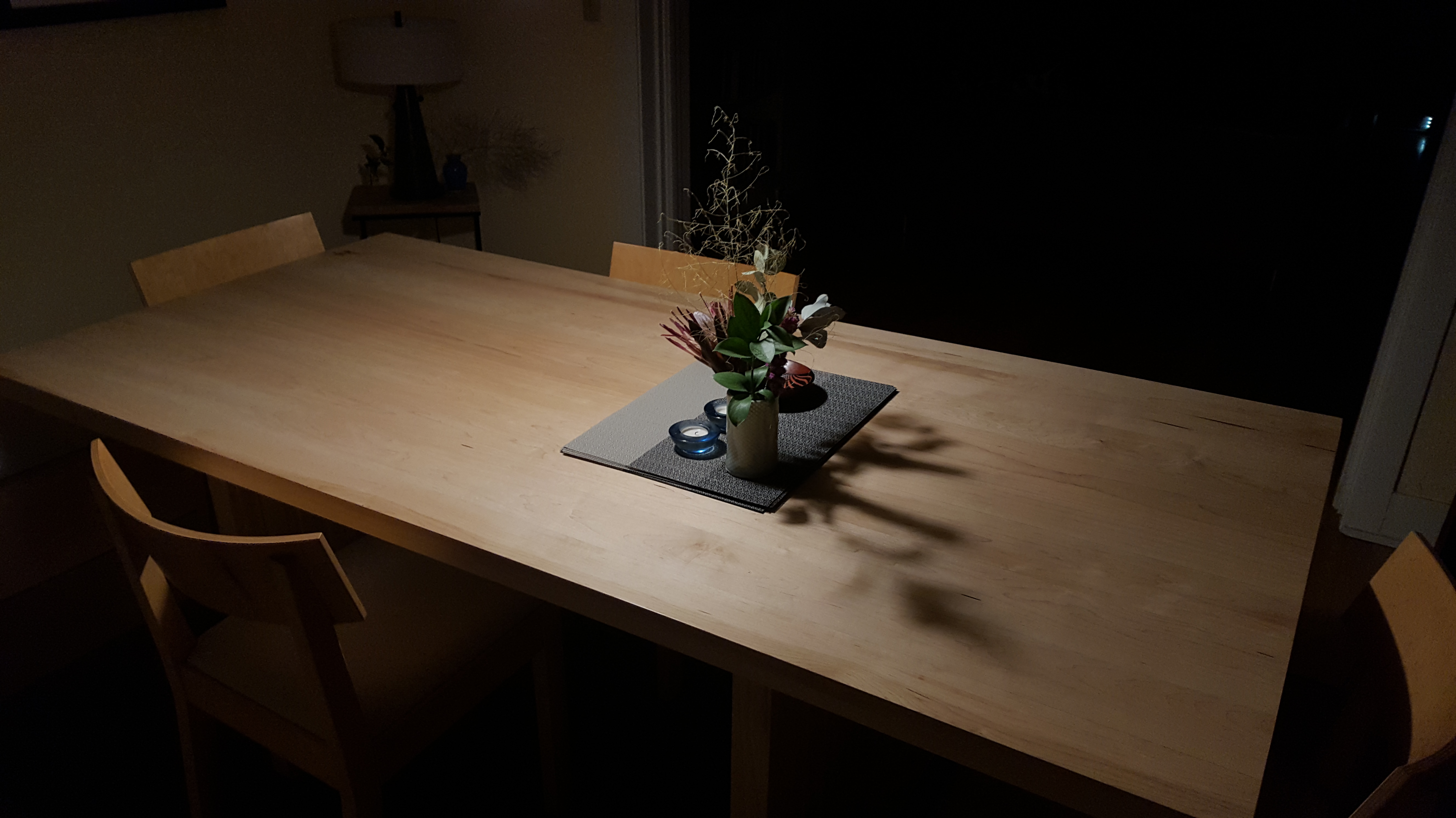 Blue vase on mid century console table